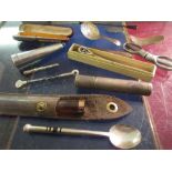 Bag containing a small quantity of various items including: two caddy spoons,