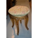 19th Century circular gilt wood and carved piano stool on cabriole supports (at fault)