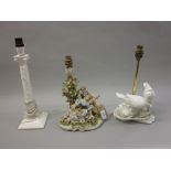 Capo di Monte porcelain table lamp in the form of two figures beside a tree together with two white