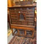 18th Century Continental walnut cabinet on stand with multiple drawers and alcove,