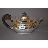 Sheffield silver oval teapot of baluster form with an ebonised handle
