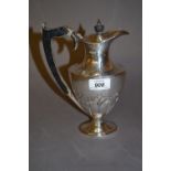 Art Nouveau Sheffield silver hot water pot with embossed decoration and ebonised handle