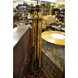 Late 19th Century rosewood billiard cue stand with a turned and fluted column centre,