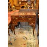 Edwardian mahogany floral painted dressing table with a hinged lid enclosing mirrors above two