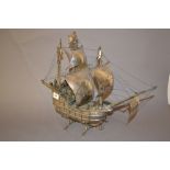 20th Century Dutch silver model of a three masted nef under full sail with various figures on the