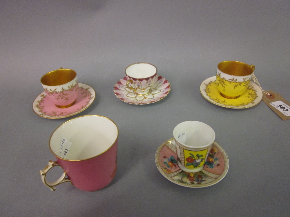 Pair of Royal Worcester porcelain miniature cups and saucers decorated in pink and yellow,