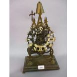 Brass single fusee skeleton clock with posing strike on a bell
