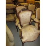 Pair of 19th Century French carved walnut open elbow chairs on cabriole front supports