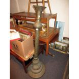 Middle Eastern brass standard lamp together with a similar large circular tray