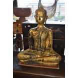 Large gold patinated bronze figure of a seated Thai goddess,