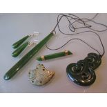 Group of New Zealand jade jewellery including a 9ct gold mounted brooch, another brooch,