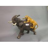Large Beswick figure of an Indian elephant with tiger on it's back,