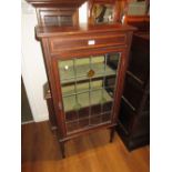 Edwardian mahogany satinwood crossbanded display cabinet with a single leaded glass door