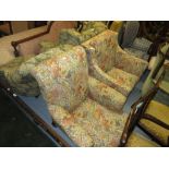19th Century floral button upholstered armchair on low turned supports together with a similarly