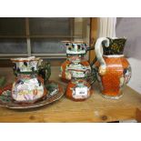 Six various 19th Century Masons Ironstone jugs (two at fault) together with a similar plate
