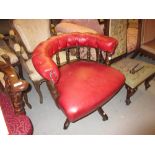 Late 19th / early 20th Century red buttoned leather upholstered revolving office chair with a