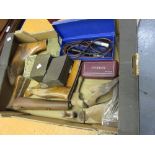 Box containing a small quantity of various shoe lasts, oriental brass box,