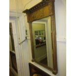 Regency gilt pier mirror decorated with figures, the mirror plate flanked by cluster columns,