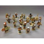 Collection of nineteen Goebel Hummel figures of children,