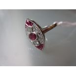 Platinum ruby and diamond marquise shaped panel ring