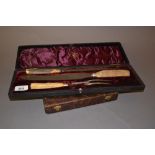 Cased horn handled carving set and a cased set of fish knives and forks