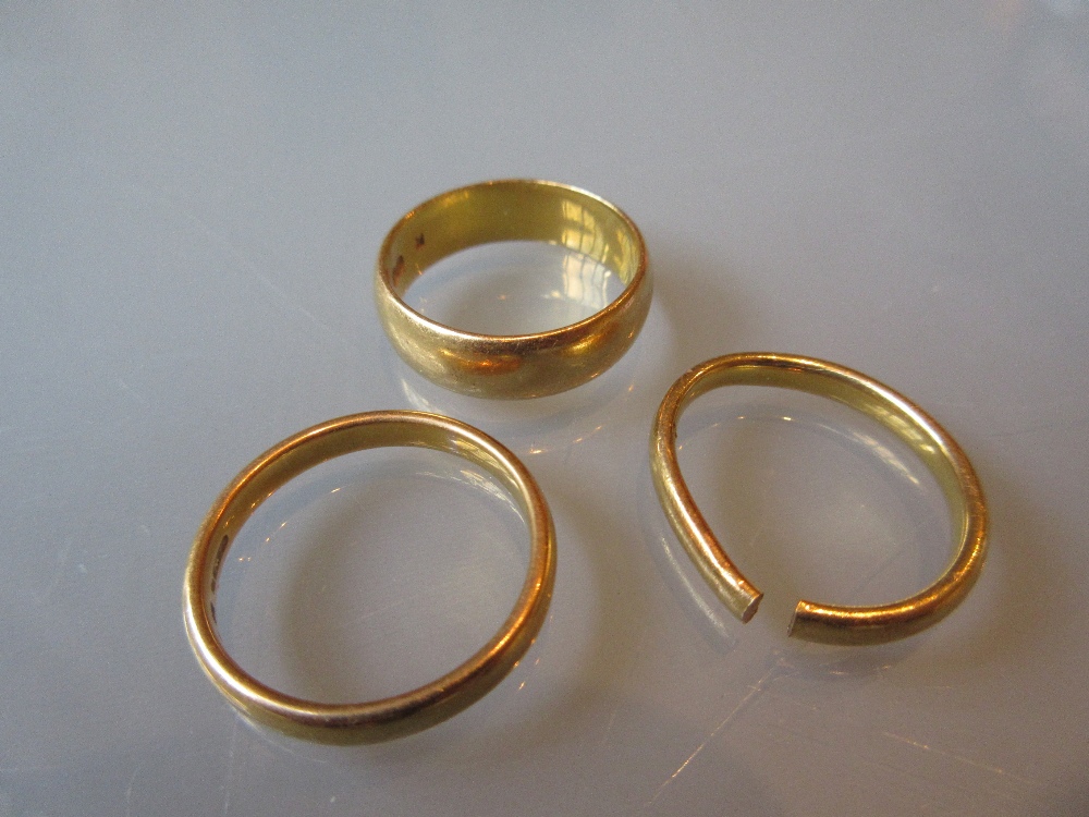 Three various 22ct gold wedding bands (one at fault) CONDITION REPORT 17.