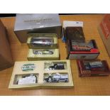 Box of various die-cast metal model vehicles