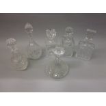 Two square cut glass decanters with stoppers,