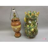 Large Continental pottery floral encrusted vase (at fault),