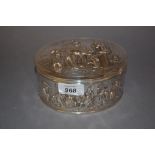 Late 19th Century Dutch silver oval box and cover decorated in relief with various figures