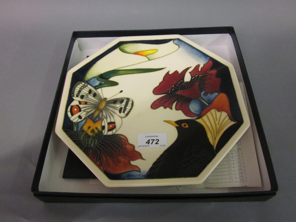 Modern Moorcroft octagonal dish decorated with butterfly, blackbird and flowers, dated 2007,
