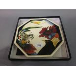 Modern Moorcroft octagonal dish decorated with butterfly, blackbird and flowers, dated 2007,