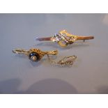 Victorian gold bar brooch set cabochon garnet together with another gold bar brooch set seed pearls