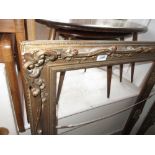 Large gilt swept picture frame, aperture 28.5ins x 36i.25ins and another swept gilt frame, 24.