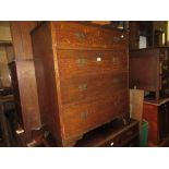 Late 19th or early 20th Century oak chest of four graduated drawers with brass handles and bracket