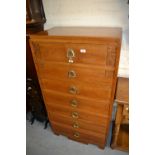 Early 20th Century French Art Nouveau walnut tall chest of seven drawers having carved details with