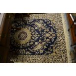 20th Century Persian rug having all-over floral decoration on a blue and cream ground with multiple