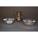 Pair of London silver circular shaped edge trinket dishes and a London silver cream jug on low hoof