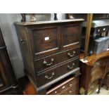 George III mahogany commode with two doors above two dummy drawers on bracket feet