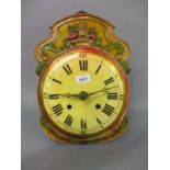 Early 19th Century Black Forest wall clock with a multi coloured painted dial and eight day