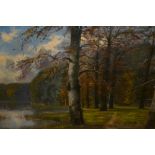 Oil on canvas, woodland path beside a lake, indistinctly signed, 19.