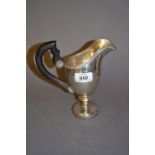 19th Century Continental white metal pedestal jug with a rosewood handle (unmarked)