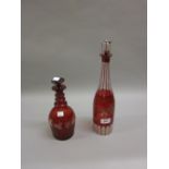 Two Bohemian red overlaid clear glass decanters with stoppers