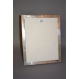 Large rectangular silver photograph frame CONDITION REPORT Silver frame has dents