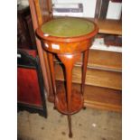 Walnut and leather inset torchere (at fault) and a small Edwardian mahogany wall cabinet with