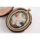 AN EARLY 19TH CENTURY MASONIC JEWEL in the form of a gilt-metal oval frame with a miniature painting