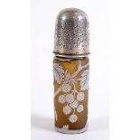 A CAMEO GLASS SCENT BOTTLE the olive glass body overlaid in white with currant, engraved top,