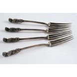 A PAIR OF 18TH CENTURY ITALIAN THREE-PRONG SMALL FORKS with cast figurehead terminals, maker's