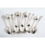 A SET OF TWELVE LATE VICTORIAN HANOVERIAN & SHELL PATTERN TEA SPOONS by T. Bradbury, London 1891;