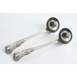 A PAIR OF EARLY VICTORIAN KING'S PATTERN SAUCE LADLES with small circular bowls, crested, by William